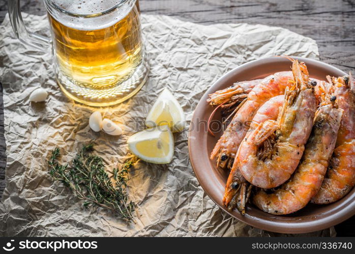 Fried shrimps with glass of beer