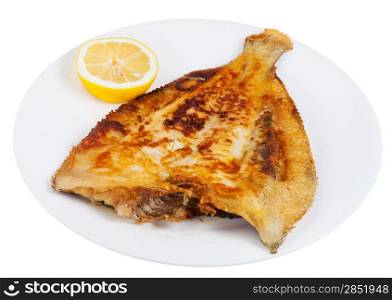 fried sole fish with lemon on white plate isolated on white background