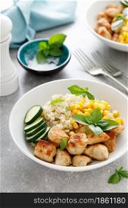 Fried turkey breast and rice with vegetables