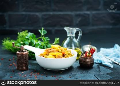 fried vegetables in bowl and on a table
