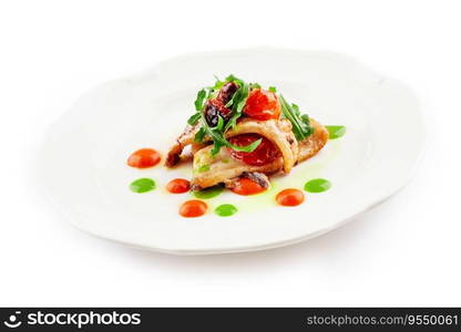 Fried white fish fillet with tomatoes and arugula