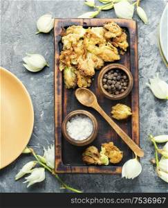 Fried yucca flowers.An unusual dish of edible flowers.. Roasted yucca flowers
