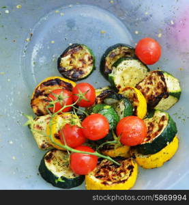 fried zucchini and tomato on dish