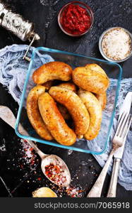 friedsausages in bowl, fried chicken sausages with spice