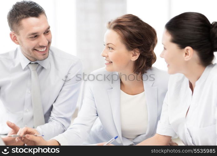 friendly business team having discussion in office