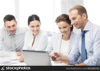 friendly business team having discussion in office