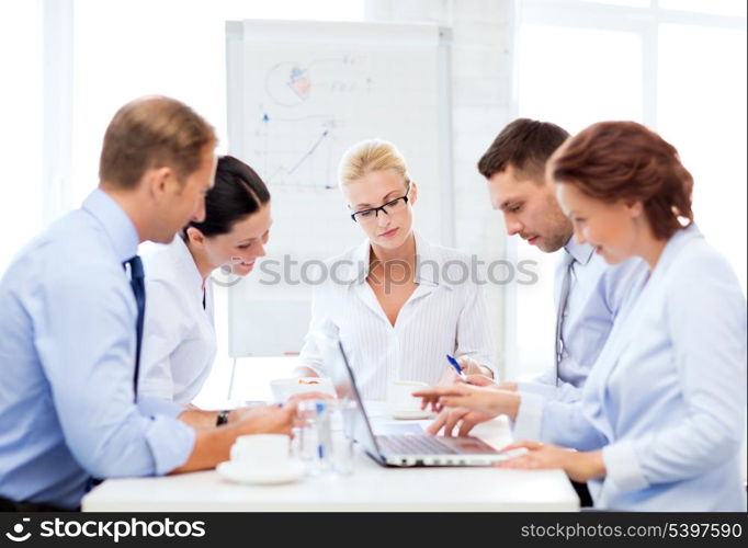 friendly business team having meeting in office