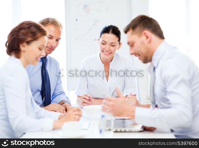 friendly business team having meeting in office