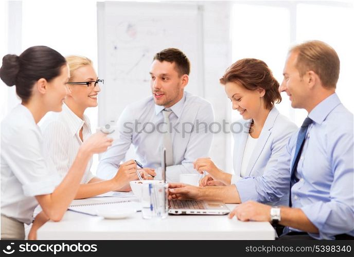friendly business team having meeting in office
