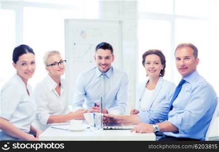 friendly business team having meeting in office. business team having meeting in office