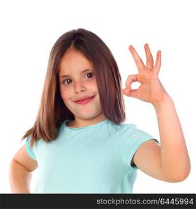 Friendly child saying Ok with her hand isolated on a white background