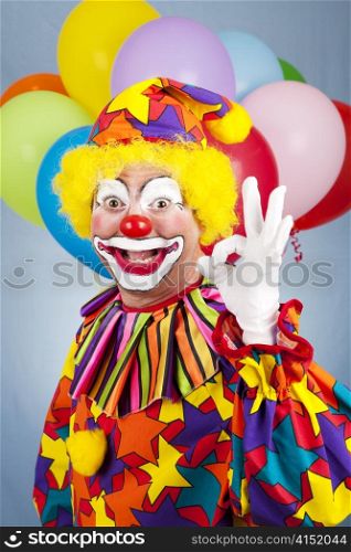 "Friendly clown giving the "okay sign" with his fingers. "