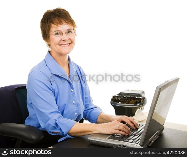 Friendly court reporter typing court transcripts into her computer. Isolated on white.
