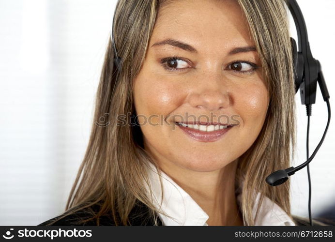 friendly customer service woman smiling at her office