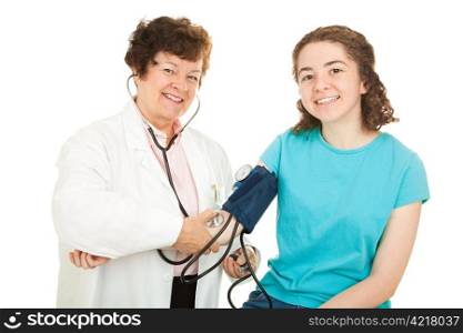 Friendly female doctor and her happy teenage patient, smiling as the doctor checks the girl&rsquo;s blood pressure. Isolated.
