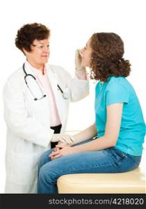 Friendly female doctor takes her teenage patient&rsquo;s temparature. Isolated on white.