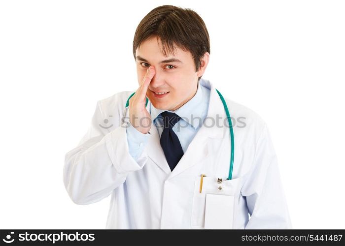 Friendly medical doctor secretly reporting good news isolated on white&#xA;