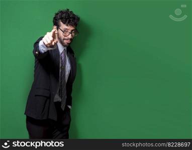 Friendly smiling business man pointing at you, Positive business people pointing at camera. Young businessman with positive attitude pointing at me