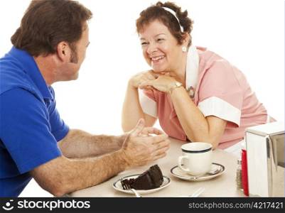 Friendly waitress in a diner listens attentively to her customer. White background.