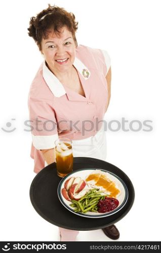 Friendly waitress serves a delicious turkey dinner and glass of iced tea. Isolated on white.