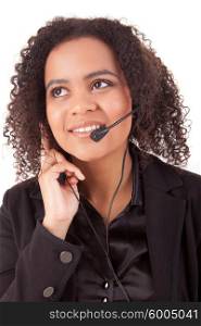 Friendly young beautiful telephone operator at work