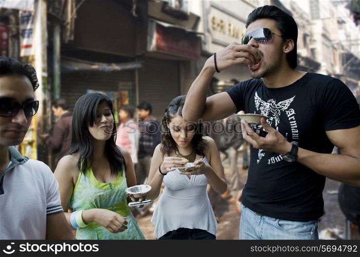 Friends enjoying street food