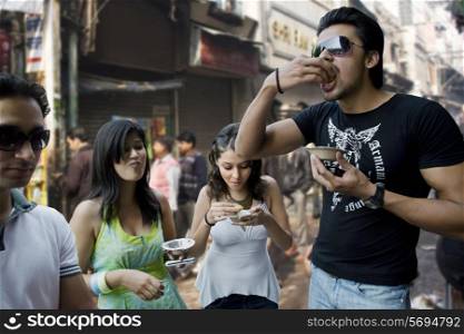 Friends enjoying street food
