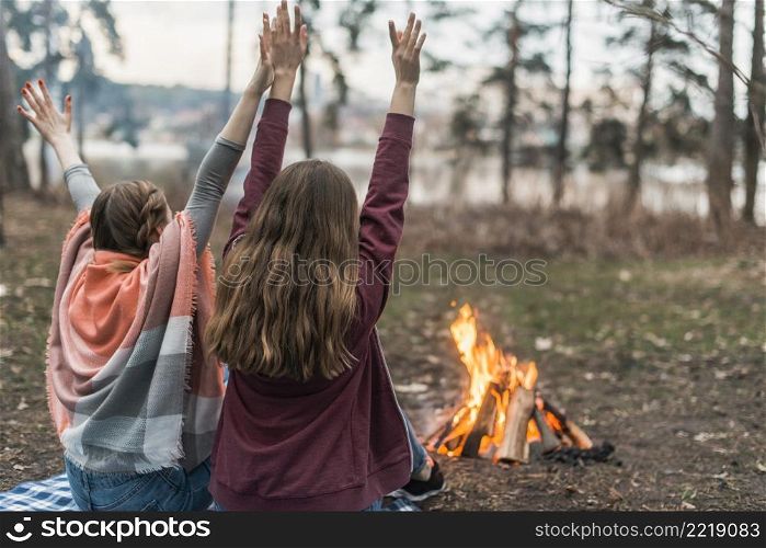 friends enjoying time bonfire