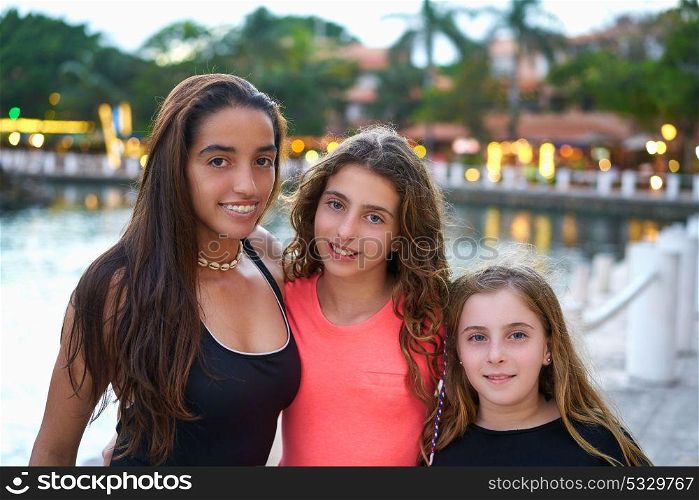 Friends girls portrait at sunset mixed ethnicity