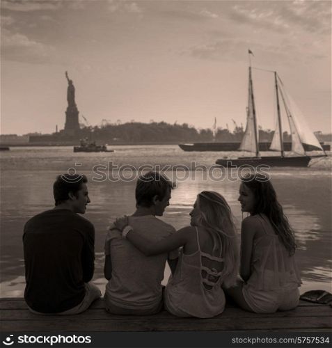 Friends group rear view at sunset happy fun in New York Manhattan photo mount