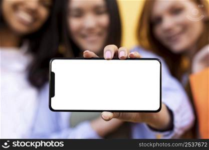 friends holding shopping bags blank phone 2