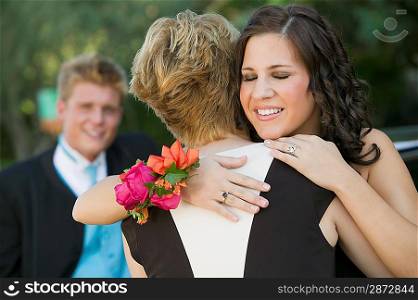 Friends Hugging at Prom