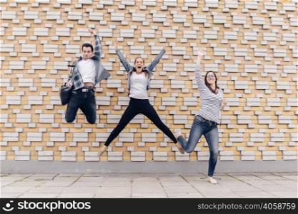 friends jumping outside