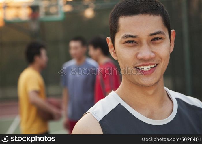 Friends on the basketball court, portrait