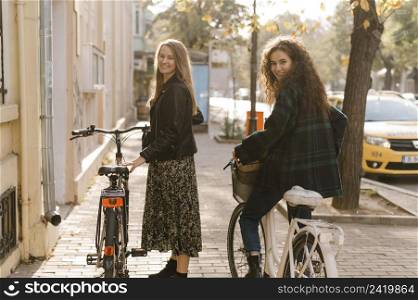 friends riding bicycles city