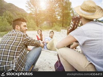 Friends sitting having picnic