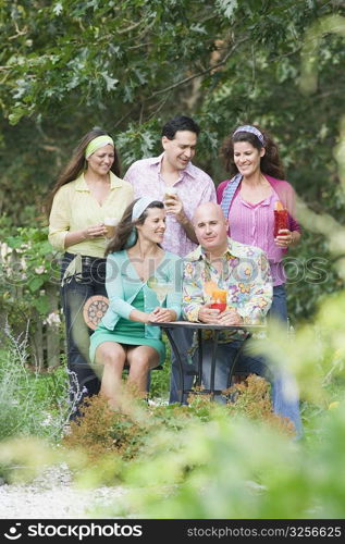 Friends smiling in a garden