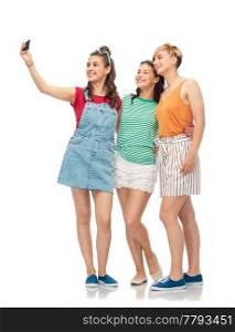 friendship and people concept - group of happy female smiling friends taking selfie by smartphone over white background. happy female friends taking selfie by smartphone