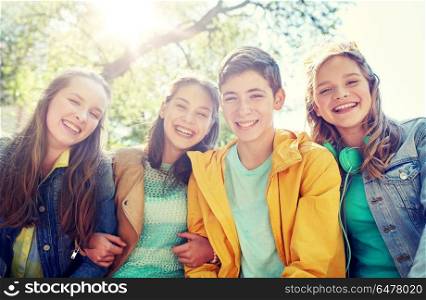 friendship and people concept - group of happy teenage students or friends outdoors. happy teenage students or friends outdoors. happy teenage students or friends outdoors