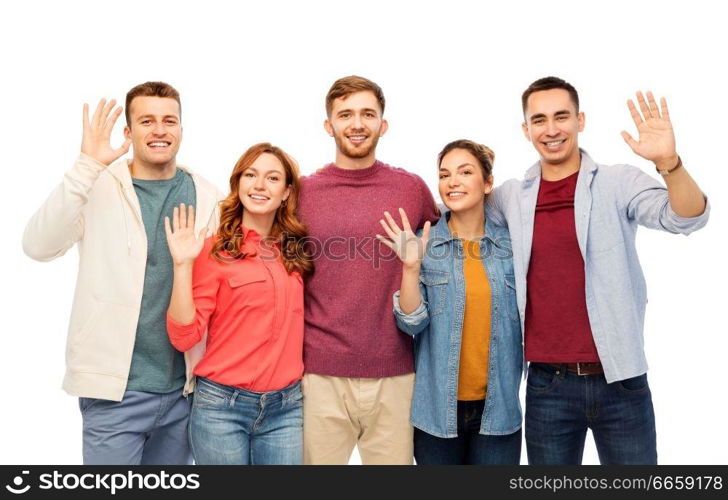 friendship and people concept - group of smiling friends over white background. group of smiling friends