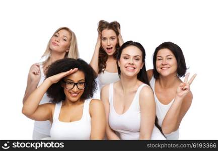 friendship, beauty, body positive and people concept - group of happy plus size women in white underwear having fun and making faces