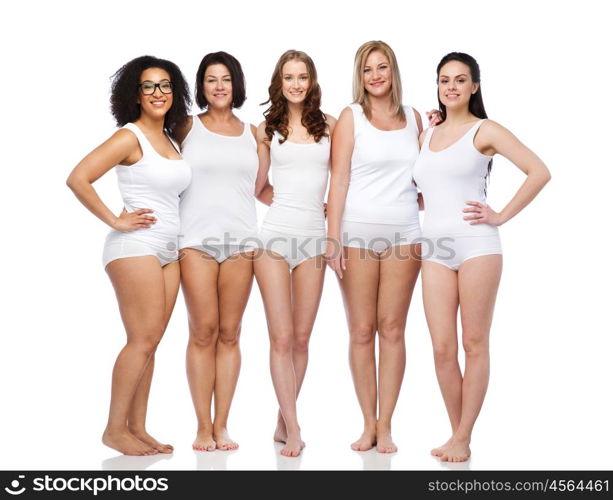 friendship, beauty, body positive and people concept - group of happy women different in white underwear