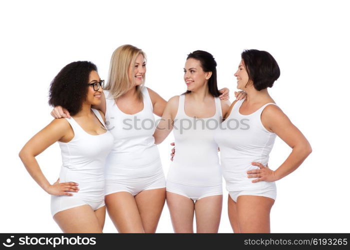 friendship, beauty, body positive and people concept - group of happy women different in white underwear