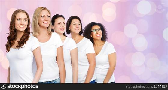 friendship, diverse, body positive and people concept - group of happy different size women in white t-shirts over rose quartz and serenity lights background