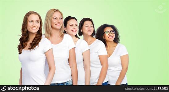 friendship, diverse, body positive and people concept - group of happy different size women in white t-shirts over green natural background