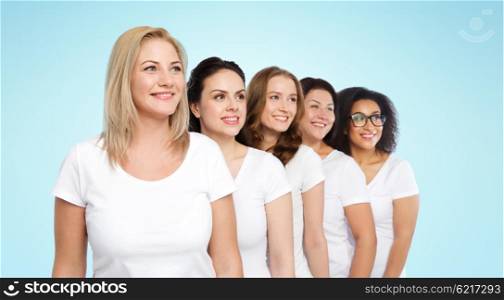 friendship, diverse, body positive and people concept - group of happy different size women in white t-shirts over blue background