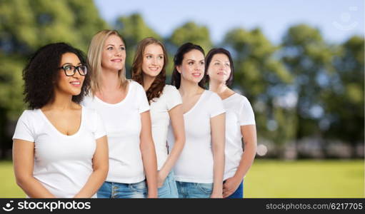 friendship, diverse, body positive and people concept - group of happy different size women in white t-shirts over summer park background