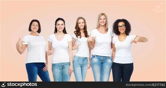 friendship, diverse, body positive and people concept - group of happy different size women in white t-shirts pointing finger to themselves over beige background