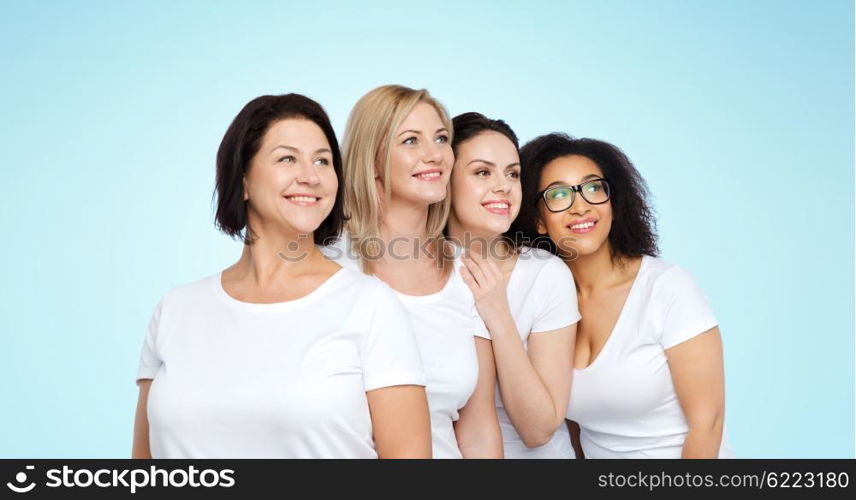 friendship, diverse, body positive and people concept - group of happy different size women in white t-shirts over blue background
