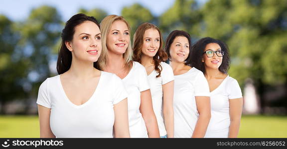 friendship, diverse, body positive and people concept - group of happy different size women in white t-shirts over summer park background